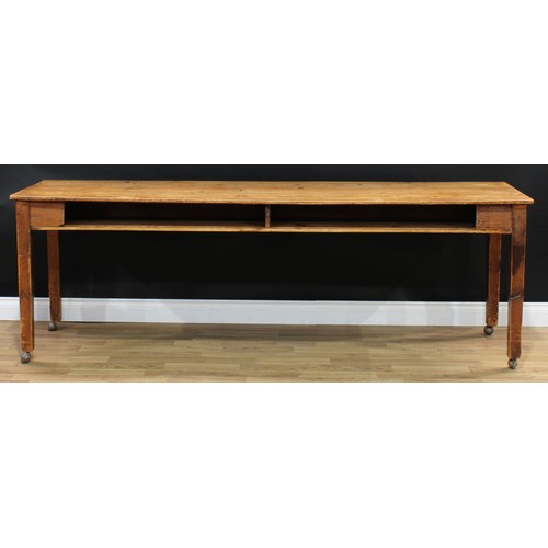 1812 - A 19th century vernacular pitch pine farmhouse serving table, slightly oversailing rectangular top a... 