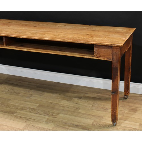 1812 - A 19th century vernacular pitch pine farmhouse serving table, slightly oversailing rectangular top a... 