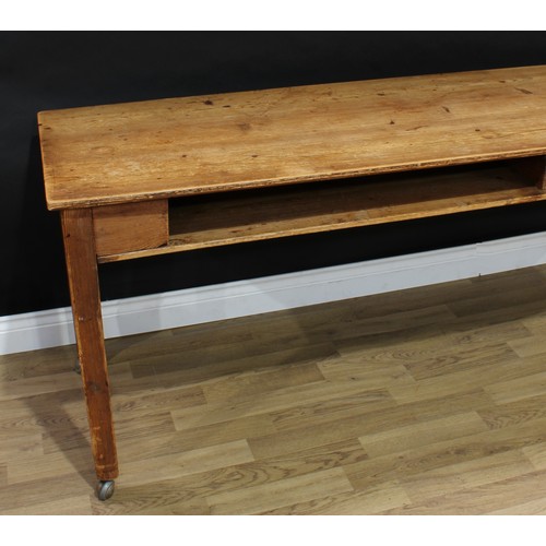 1812 - A 19th century vernacular pitch pine farmhouse serving table, slightly oversailing rectangular top a... 