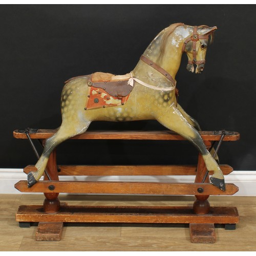 3236 - A late 19th/early 20th century English rocking horse of small proportions on safety stand, probably ... 