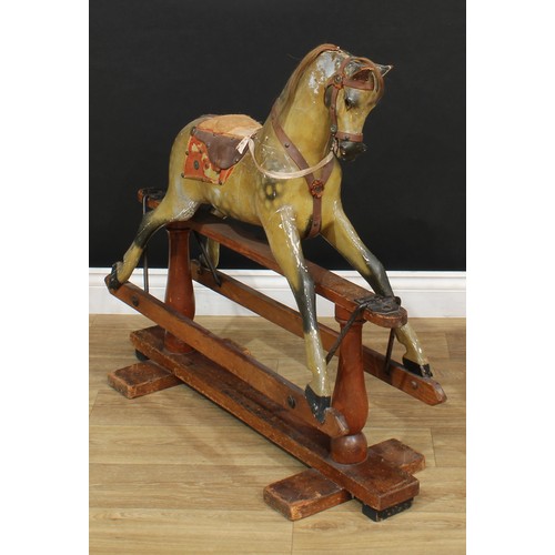 3236 - A late 19th/early 20th century English rocking horse of small proportions on safety stand, probably ... 