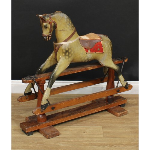 3236 - A late 19th/early 20th century English rocking horse of small proportions on safety stand, probably ... 