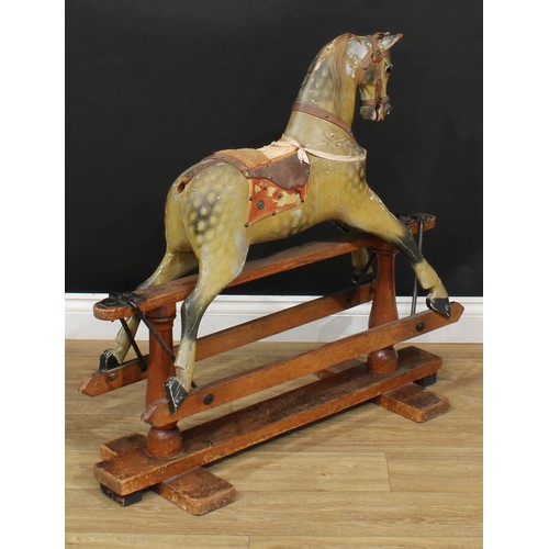 3236 - A late 19th/early 20th century English rocking horse of small proportions on safety stand, probably ... 