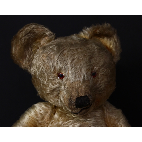 3274 - A 1930's Merrythought golden mohair jointed teddy bear, amber and black glass eyes with white glass ... 
