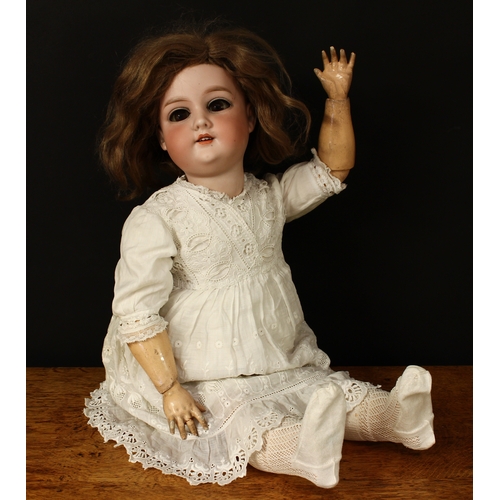 3299 - An Armand & Marseille (Germany) bisque head and ball jointed composition bodied doll, weighted sleep... 