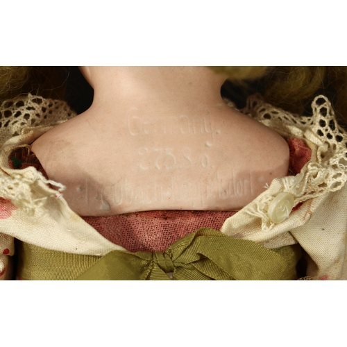 3300 - A Heubach Koppelsdorf (Germany) bisque shoulder head and partially stuffed cloth bodied doll, weight... 