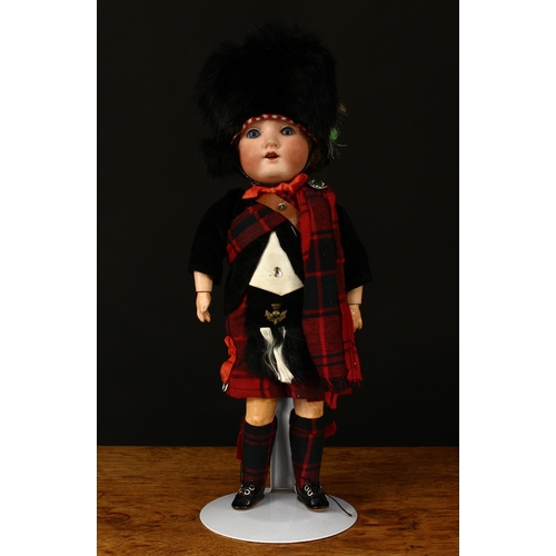 3301 - An Armand & Marseille (Germany) bisque head and fixed ball jointed composition bodied doll, weighted... 