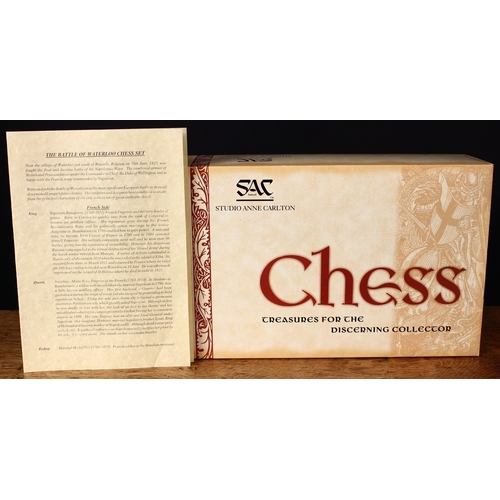 3350 - A Studio Anne Carlton Battle of Waterloo chess set, boxed with literature and a chess board, boxed (... 