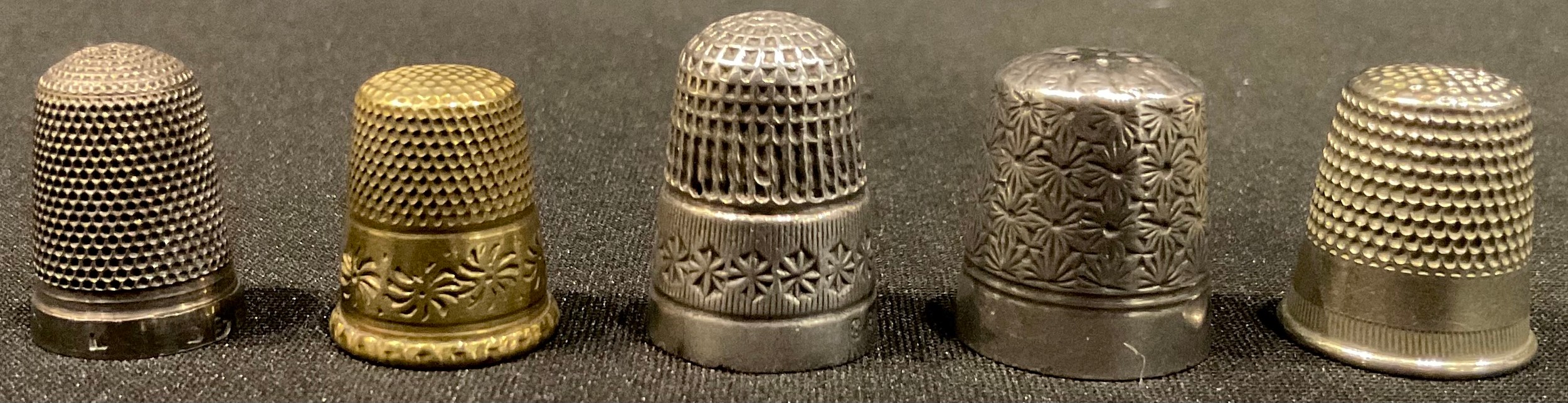 A Charles Horner silver thimble, Chester 1901; another silve...