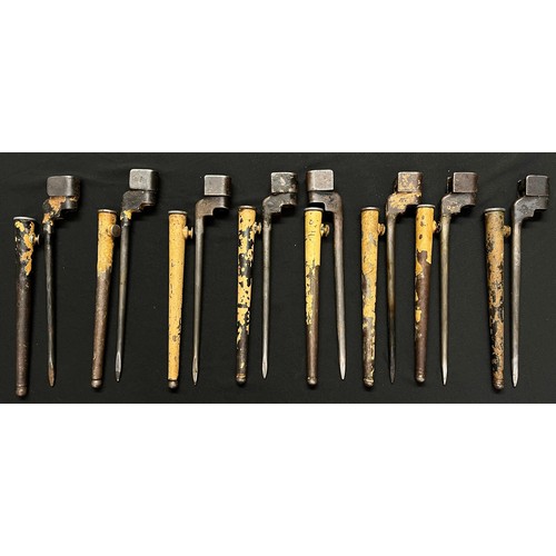 2147 - WW2 British No4 MKII bayonet collection: 8 examples all in issued condition with remains of desert c... 