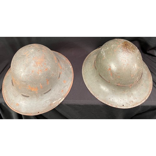 2148 - WW2 British Home Front Firewatchers Steel Helmets. Two examples. Both with original paint. One with ... 