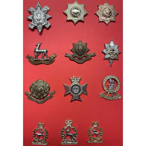 2193 - A collection of approx. 85 British Cap badges plus some collar dogs to include: RE inc Officers Bron... 