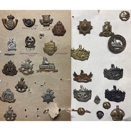 2194 - A collection of approx. 100 British & Commonwealth Cap badges plus some collar dogs and WW1 War Serv... 