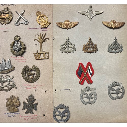 2194 - A collection of approx. 100 British & Commonwealth Cap badges plus some collar dogs and WW1 War Serv... 