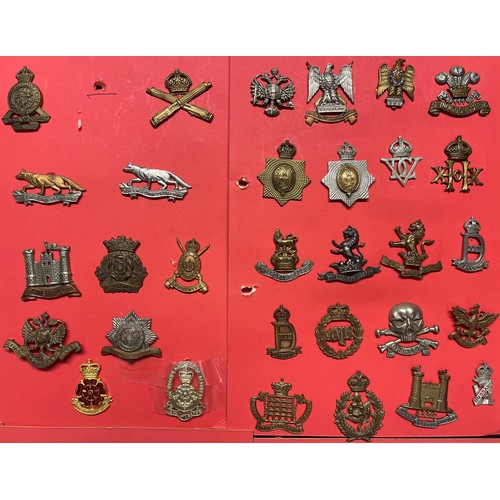 2195 - A collection of approx. 120 British Cap badges to include: Royal Artillery, Queen Own Yeomanry, Inis... 