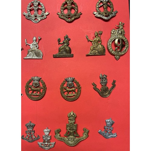 2195 - A collection of approx. 120 British Cap badges to include: Royal Artillery, Queen Own Yeomanry, Inis... 