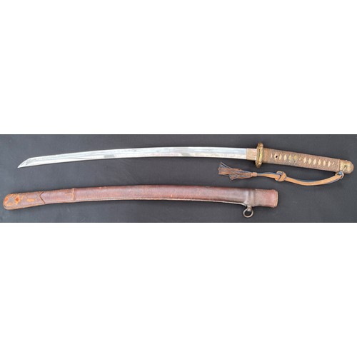 2217 - WW2 Imperial Japanese Officers Shin Gunto Katana Sword. Single edged 660mm long blade. Tang is signe... 