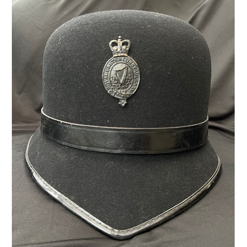 2261 - Royal Ulster Constabulary Bowler Helmet with small Queens Crown badge. Complete with liner and chins... 