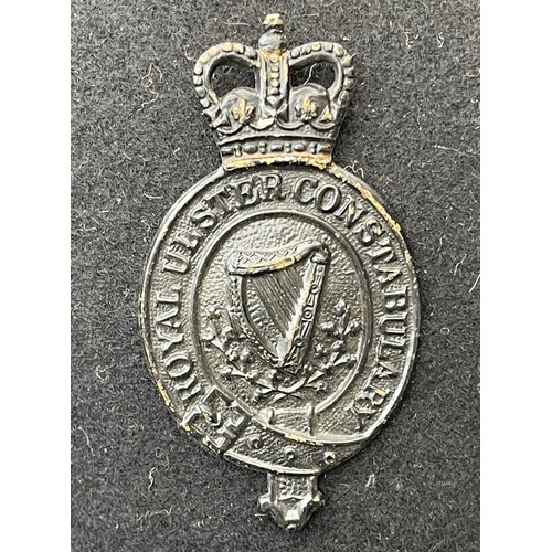 2261 - Royal Ulster Constabulary Bowler Helmet with small Queens Crown badge. Complete with liner and chins... 