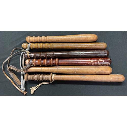 2281 - A Collection of six British Police Truncheons of different designs and sizes. None are maker marked.... 