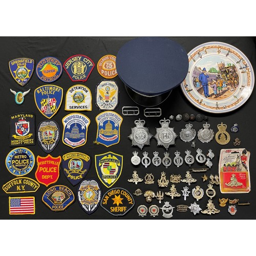 2283 - A collection of Queens Crown Police Helmet Plates and cap badges and one Kings Crown Stoke on Trent ... 