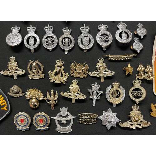 2283 - A collection of Queens Crown Police Helmet Plates and cap badges and one Kings Crown Stoke on Trent ... 