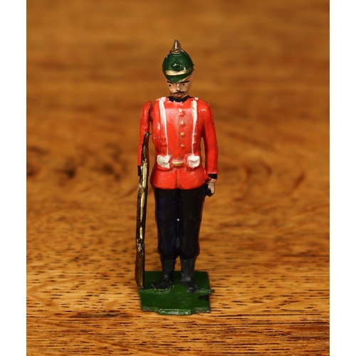 3388 - Abel, CD (Islington, London 1898-1914) a rare Somerset Light Infantry figure standing to attention, ... 