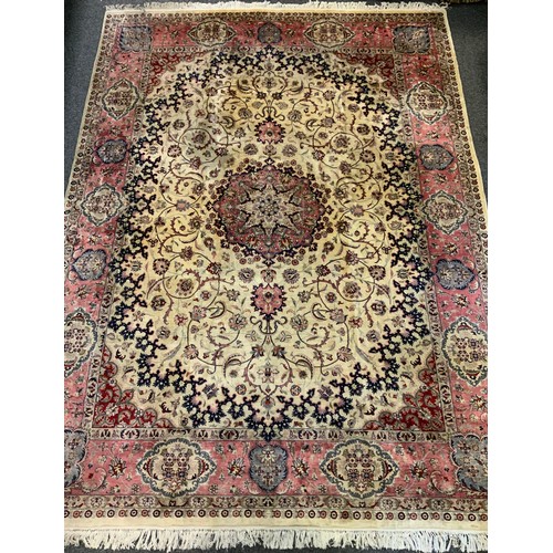 225 - A large, Middle-eastern Tabriz silk and wool rug, 374cm x 278cm.