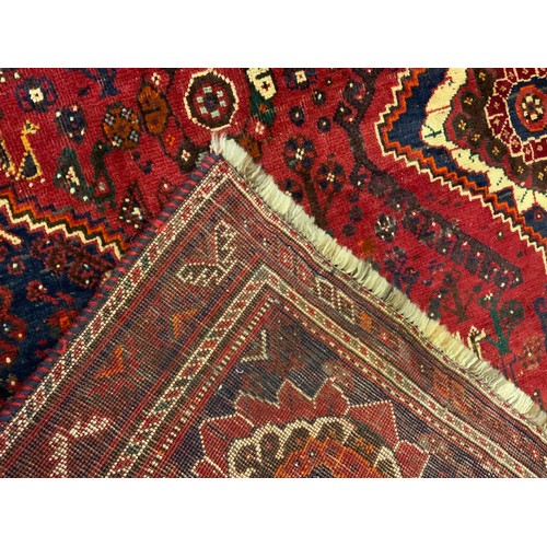 247 - A Qashgai carpet, approx 253cm x 173cm