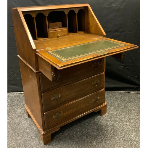 277 - A Bevan funnell Reprodux oak bureau of small proportions, 94.5cm high, 58cm wide, 41cm deep.