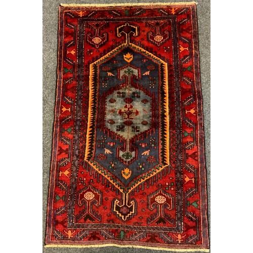 391 - An Azanjan rug, approx 205c, x 128cm