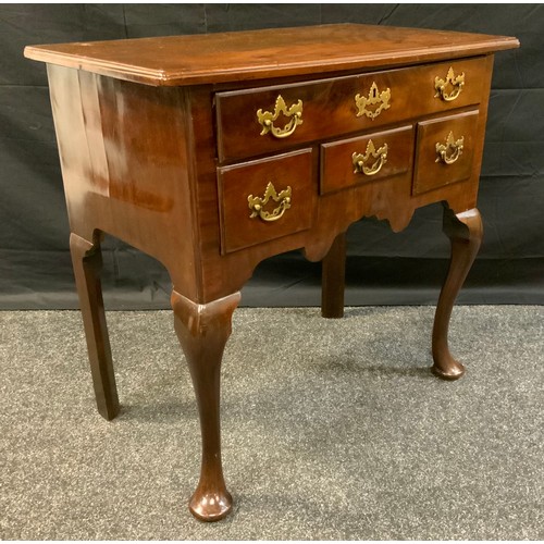 394 - A George III style mahogany lowboy, over sailing top above one long and three short frieze drawers, ... 