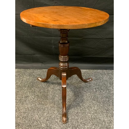 398 - A 18th century tilt top tripod table, circular top, turned column angled feet