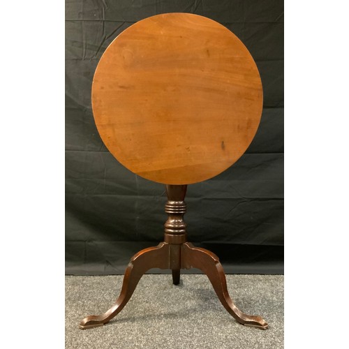 398 - A 18th century tilt top tripod table, circular top, turned column angled feet