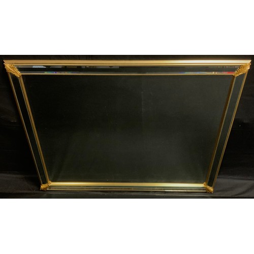 402 - A rectangular gilt frames wall mirror, bevelled plate and surround, 88cm x 104cm