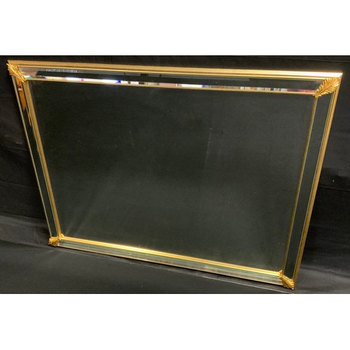 402 - A rectangular gilt frames wall mirror, bevelled plate and surround, 88cm x 104cm