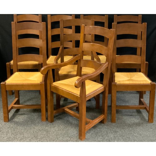 258 - A set of eight contemporary oak dining chairs, comprising two carvers, and six chairs, (8).