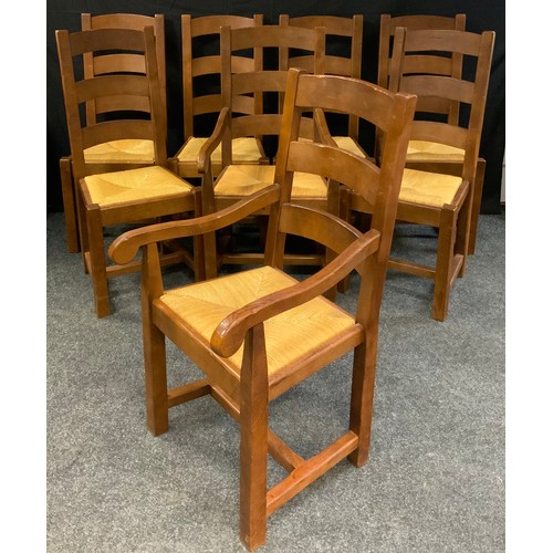 258 - A set of eight contemporary oak dining chairs, comprising two carvers, and six chairs, (8).