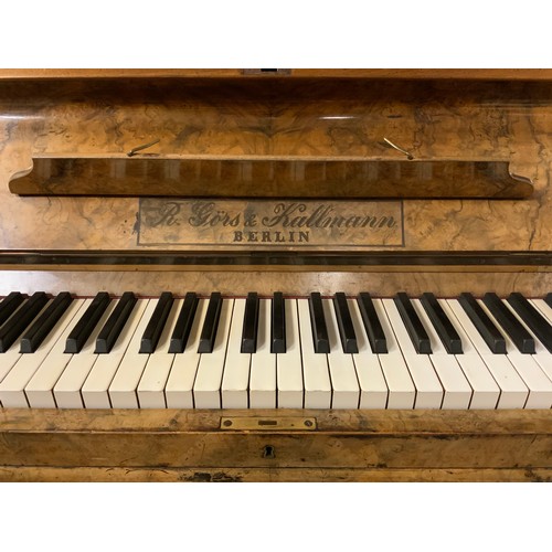 272 - A R Gors and Kallmann of Berlin burr walnut upright piano, iron frame,  with candle sconces
Ivory Re... 