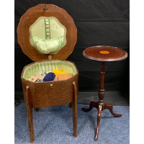 397 - An Edwardian style inlaid mahogany wine table, circular top, turned column, tripod feet; an oak sewi... 