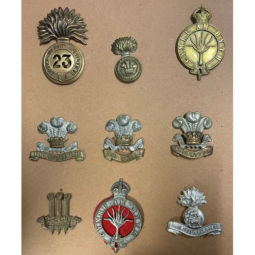 2335 - WW2 British Cap badge collection of approx. 120 items to include London Regts, Scottish and Welsh Re... 