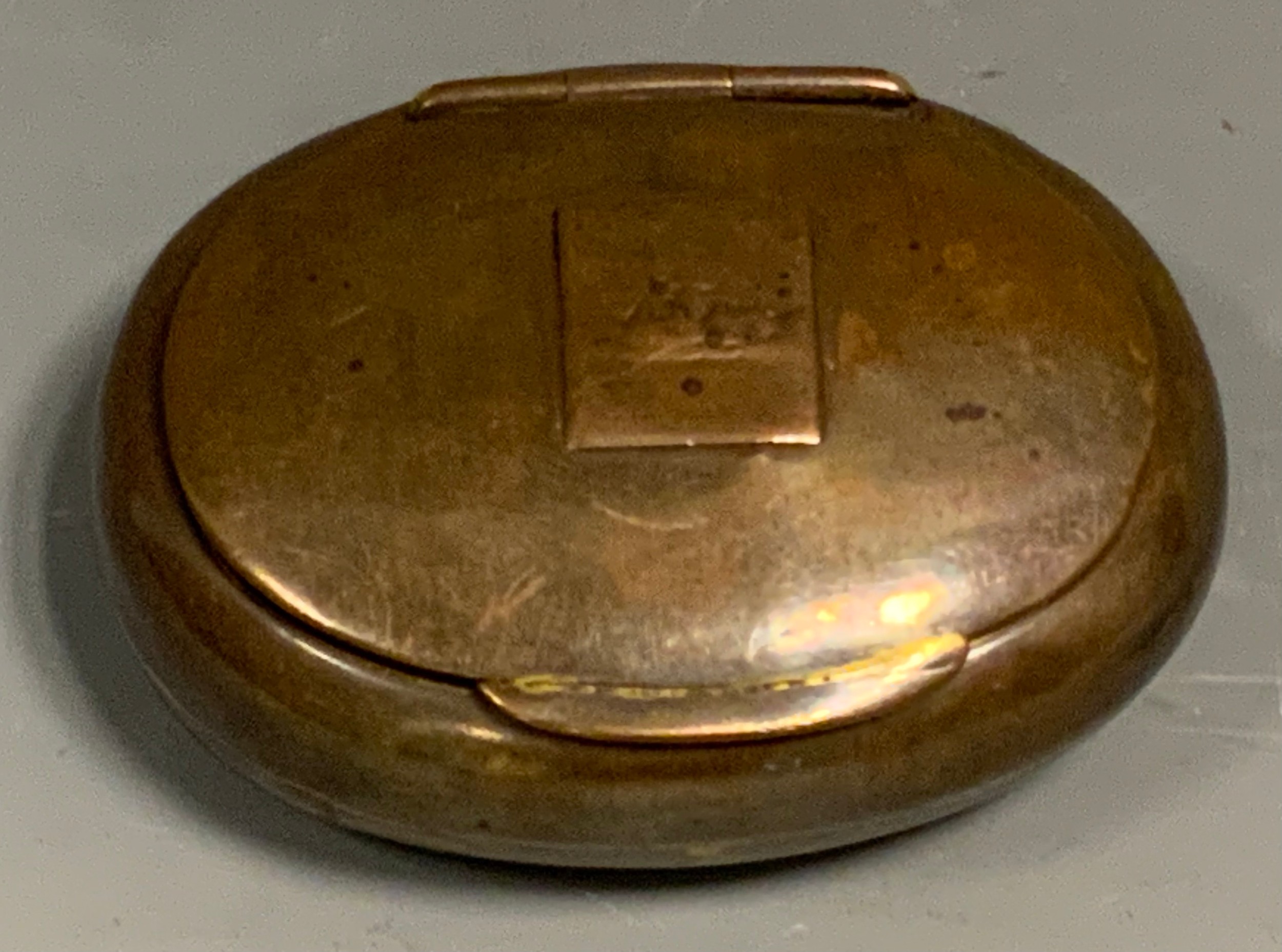 A 19th century oval snuff box hinged cover cast with galleon 8cm