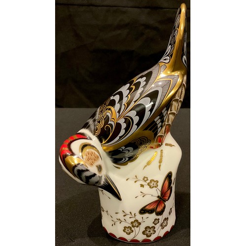 21 - A Royal Crown Derby paperweight, Greater Spotted Woodpecker, Connaught House exclusive, limited edit... 