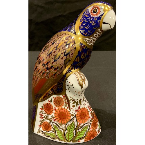 22 - A Royal Crown Derby paperweight, Bronzed Winged Parrot, gold stopper, certificate, boxed