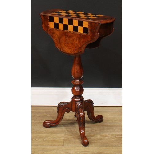 8 - A Victorian walnut and mahogany tripod games table, of small and neat proportions, shaped top with f... 