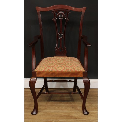 9 - A set of eight Chippendale design dining chairs, comprising six side chairs and a pair of carvers, t... 