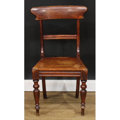 19 - A 19th century child’s Windsor rocking chair, 65.5cm high, 38cm wide, the seat 28cm wide and 23cm de... 