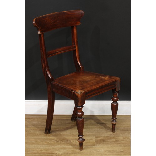 19 - A 19th century child’s Windsor rocking chair, 65.5cm high, 38cm wide, the seat 28cm wide and 23cm de... 