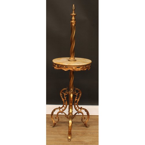 111 - A Rococo design brass floor lamp, onyx plateau, 133cm high