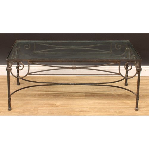 628 - A Laura Ashley glass and cast metal recanglar coffee table, 46cm high, 110cm long, 60cm wide